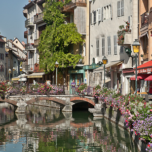  bridge and colourful flowered walkways- le thiou river at Annecy 